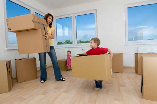 Local small removals team transporting household items in Dartmouthpark