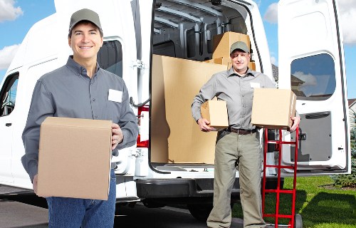 Careful packing of fragile household items for house removals in Dartmouthpark