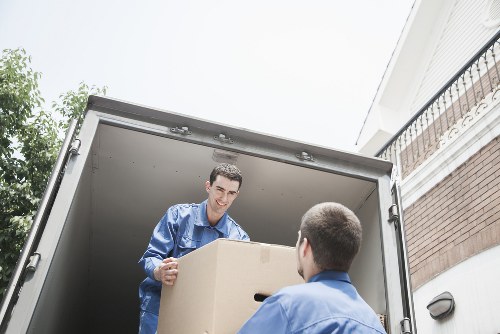 Boxes and furniture prepared for a man and van move